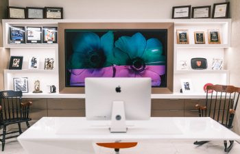 Modern office interior at Avance Plastic Surgery Institute with desk and seating